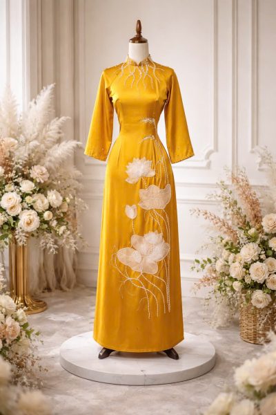 Mẫu áo dài bà sui màu vàng đính kết hoa tiết hoa sen voan trắng (XL)